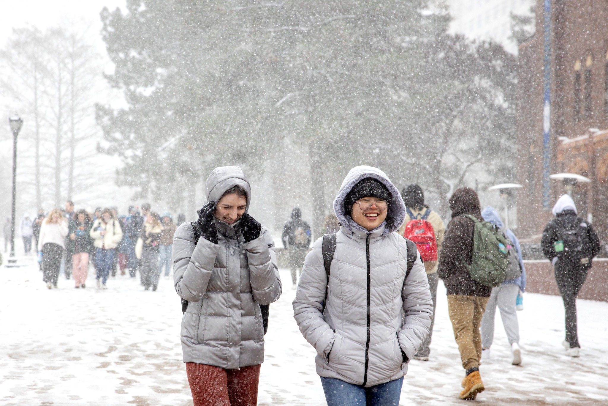 Students Walk To Class In The Falling Snow On February 16, 2024.